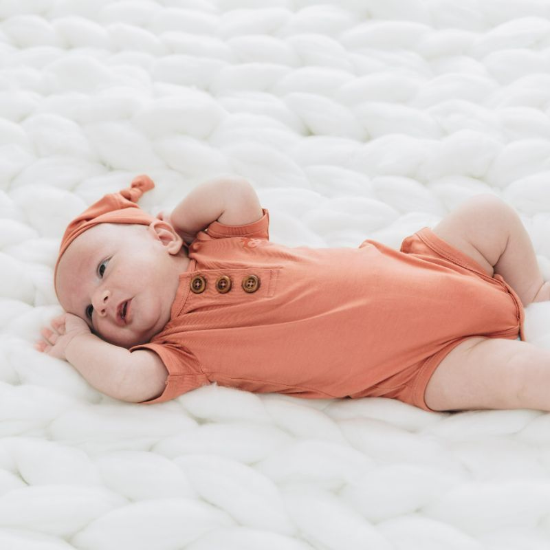 Copper Kiss Newborn Onesie